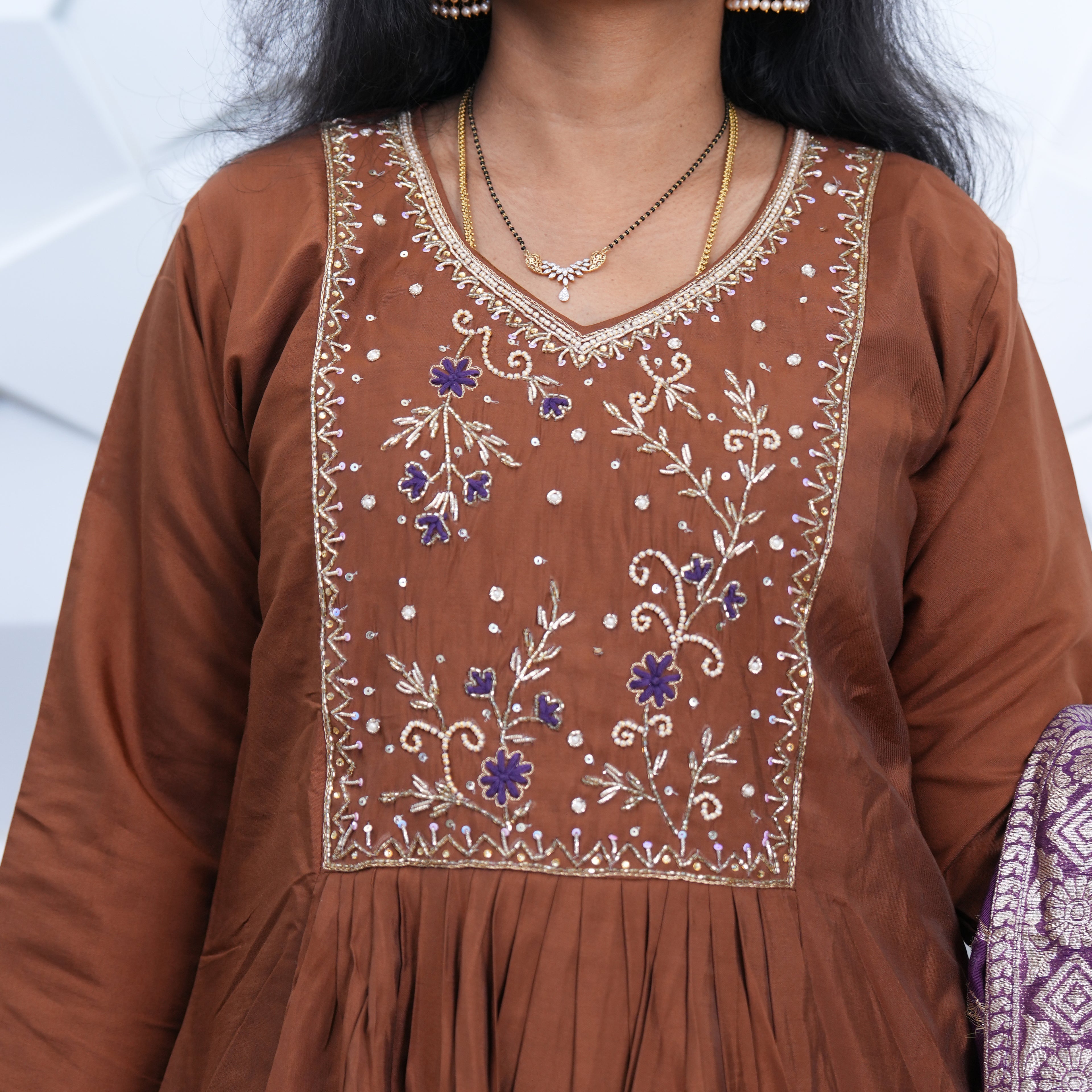 Earthy Terracotta Pleated Kurta Set with Royal Purple Zari Dupatta